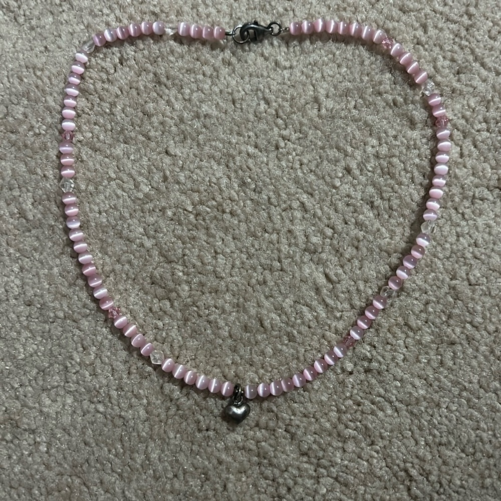 Pink necklace with heart charm